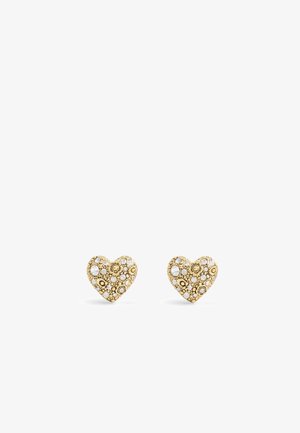 Orecchini a forma di cuore in oro con motivi floreali intricati, adornati con cristalli di diverse dimensioni per un tocco di brillantezza e texture.