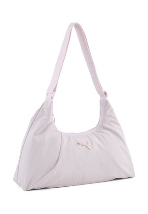 Sac à bandoulière Puma rose clair avec une sangle ajustable unique et un petit logo Puma au centre devant.