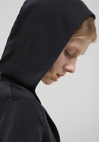 Calliope CON CAPPUCCIO  - Bluse - nero