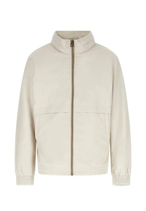 Giacca beige con zip, colletto alto, maniche lunghe, polsini elastici e tasche laterali, mostrata su sfondo bianco.