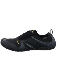 Black athletic shoe featuring a combination of textured fabric and synthetic overlays, with a rubber sole and yellow accents.