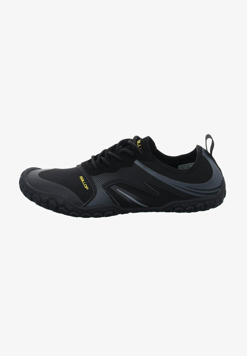 Black athletic shoe featuring a combination of textured fabric and synthetic overlays, with a rubber sole and yellow accents.