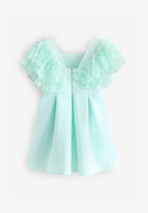 Minta zelena obleka z cvetnimi čipkastimi rokavi, zadrgo na hrbtni strani in nabranim krilom z diskretnim embosiranim vzorcem.