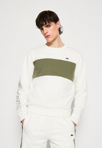 Lacoste UNISEX - Športni pulover - flour/oliv