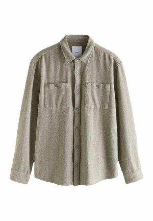 Light gray, herringbone-patterned shirt made of textured fabric. Features a pointed collar, long sleeves, and two chest pockets with buttons.