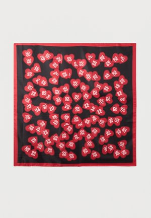 Siidist sall, millel on must taust punaste südamega, kus on valgete tähtedega kiri "HUGO". Ääristatud punase äärega.