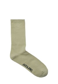 Lichtgroene katoenen sok met een geribbelde structuur. Voorzien van een zwart "JACK & JONES" logo vlakbij de teen. Standaard crew lengte ontwerp.