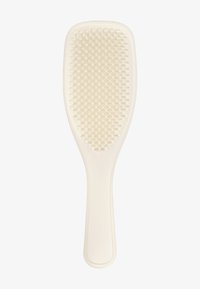 Brede paddle haarborstel met een gladde ivoorkleurige kunststof handgreep, een geweven borsteloppervlak met ronde rubberen haren.