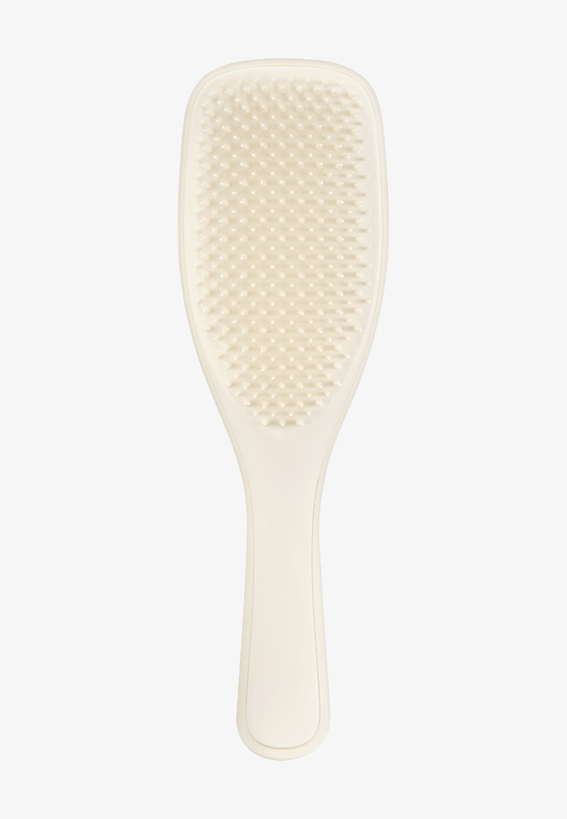 Brede paddle haarborstel met een gladde ivoorkleurige kunststof handgreep, een geweven borsteloppervlak met ronde rubberen haren.