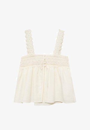 Witte mouwloze top met geschulpte kanten bandjes, een geplooide bovenkant en een losse, uitlopende zoom met een gestrikt detail aan de achterzijde in het midden.