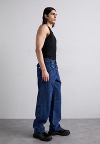 GmbH WORKWEAR TROUSERS - Relaxed fit jeans - indigo