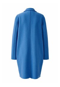 Blauwe wollen jas met een gestructureerde afwerking, met schouderflappen en een rechte schouderlijn. Middenlange ontwerp met een rechte silhouette en geen zichtbare sluitingen.