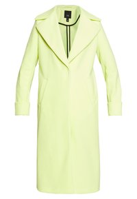 Light yellow wool coat with a notched collar, long sleeves, and side pockets. Features a straight cut and minimalistic design.