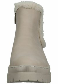 Bottines beiges avec un col en fausse fourrure et une fermeture éclair sur le côté. Tige synthétique lisse, semelle en caoutchouc avec un détail de grip texturé.