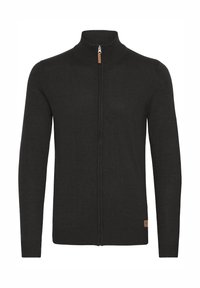 Svart zip-up kofta med hög ribbad krage, långa ärmar, ribbade muddar och fåll. Har en läderdetalj nära fållen.