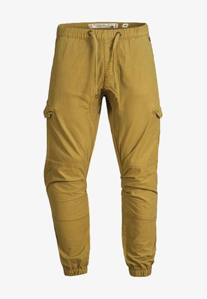 Pánske horčicovo žlté cargo jogger nohavice s elastickým pásom, sťahovacou šnúrkou, bočnými prednými vreckami s klopami, švami na kolenách a elastickými lemy.