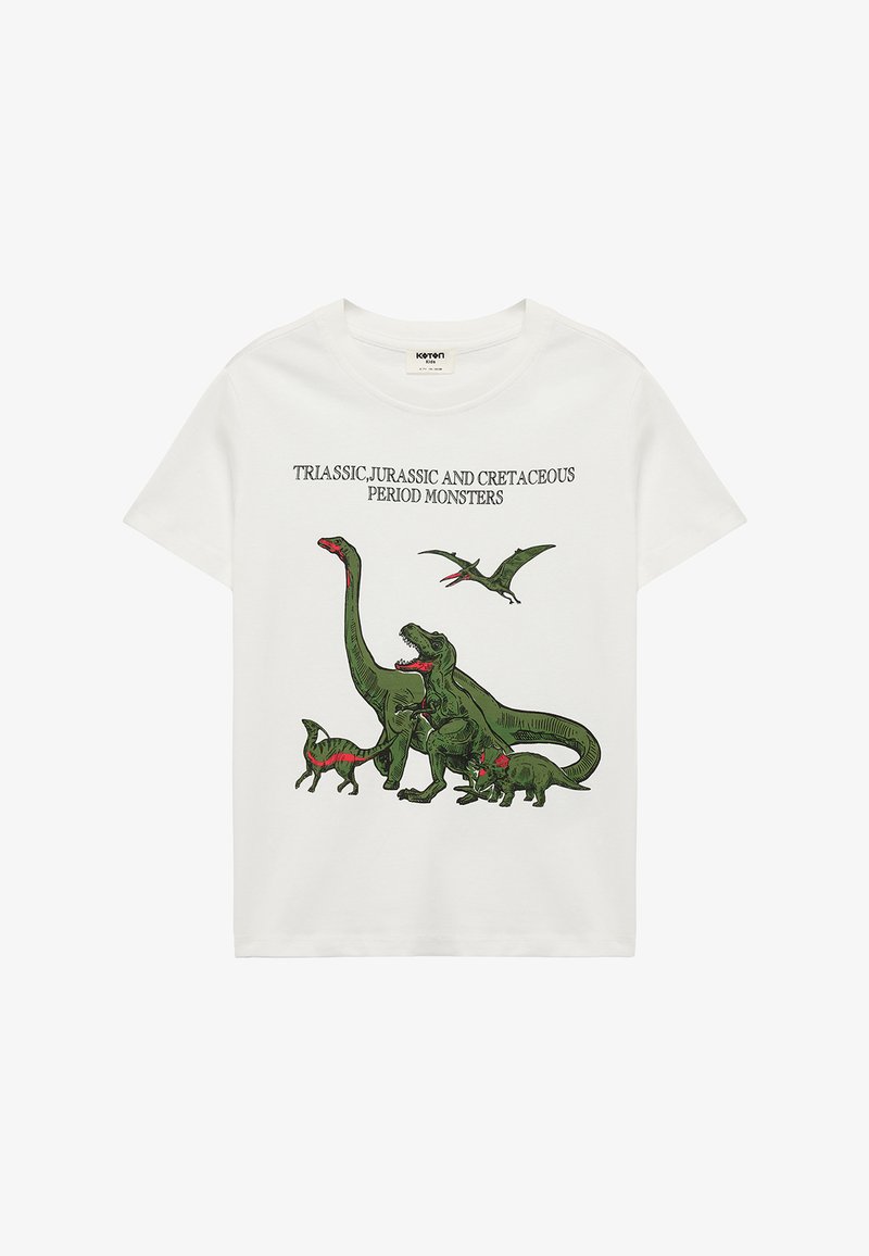 Camiseta blanca de manga corta con ilustraciones de dinosaurios verdes y rojos, y texto que dice "Monstruos de los períodos Triásico, Jurásico y Cretácico."