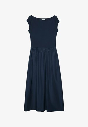 Mornarnički plavi haljina do koljena sa prilagođenim gornjim dijelom, kratkim rukavima i nabranom suknjom. Izrađena od glatkog, mekanog materijala.