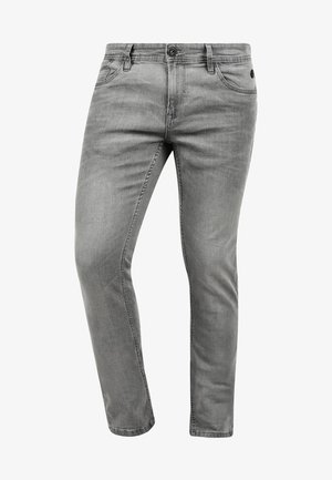Jeans en denim gris avec une coupe slim, design à cinq poches, fermeture à bouton sur le devant, et effets de froissement subtils sur le tissu.