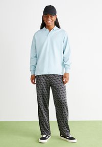 Puma Poloshirt - turquoise surf