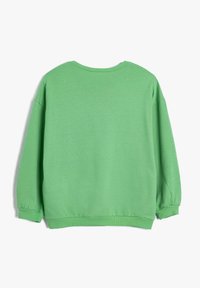Zielona bluza, miękka mieszanka bawełny, okrągły dekolt, długie rękawy z elastycznymi mankietami, lekko oversize'owy krój, gładka faktura, prosty wzór.