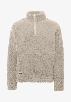 Világos bézs színű polár pulóver magas gallérral, negyed cipzárral, elülső zsebbel és struktúrált felülettel. Laza fazon és varrott díszítések jellemzik.