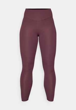 Burgundi leggings rugalmas anyagból; magas derék, testhez simuló fazon, sima felület, varrás nélküli kivitelezés, és nincsenek látható minták vagy díszítések.