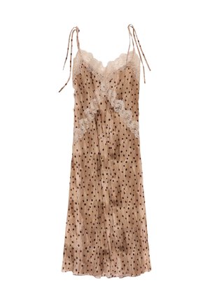 Abito sottoveste in raso beige con pois neri, bordatura in pizzo sullo scollo e sulla parte centrale, e sottili laccetti sulle spalle.