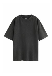 Dark gray oversized t-shirt made from cotton, featuring short sleeves, a round neckline, and visible stitching details at seams.