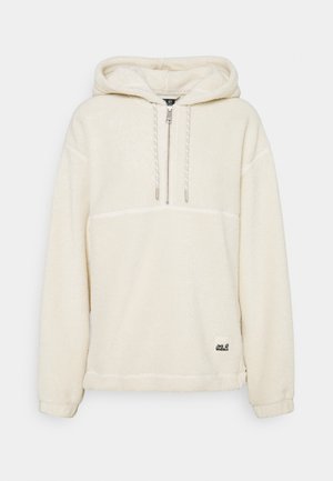 Kremowa polarowa bluza z kapturem z zamkiem o połowie długości, regulowanymi sznurkami oraz naszywką z logo na dolnym brzegu. Miękki, teksturowany materiał.