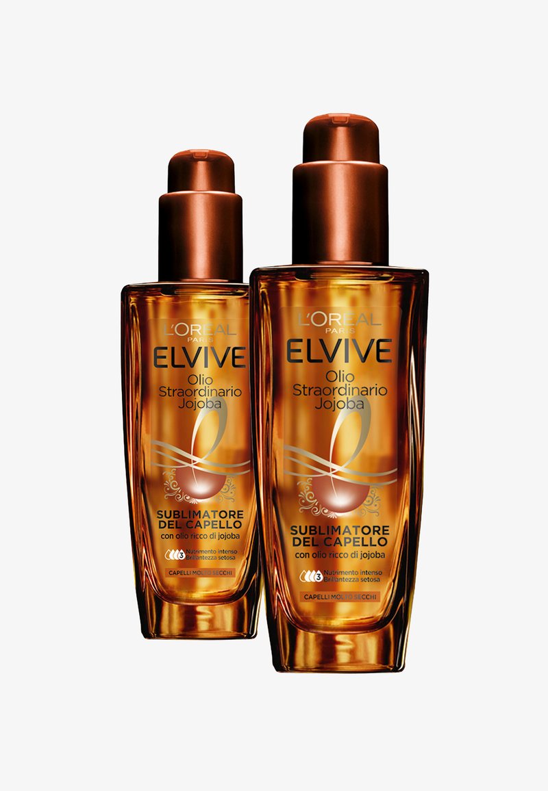 Bottiglie di olio per capelli L'Oréal Elvive all'olio di jojoba, con vetro ambrato, pompe bronzo e testo audace che evidenzia i benefici dell'olio di jojoba.