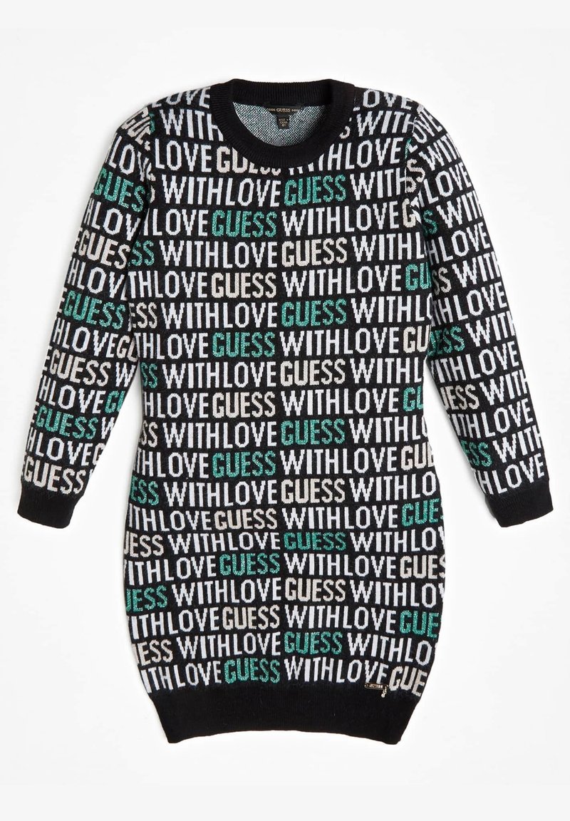 Pletené šaty s černým podkladem a bílým a tyrkysovým nápisem „S LÁSKOU GUESS“. Kulatý výstřih a dlouhé rukávy, strukturovaná tkanina.