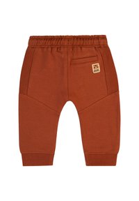 Rostfärgade sweatpants i mjuk tyg, med elastiskt midjeband, bakficka och texturerade sidopaneldetaljer.