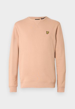 Zalmkleurige sweatshirt van zachte stof, met een ronde hals en geribde boorden. Voorzien van een zwart-geel geborduurd logo op de linkerborst.