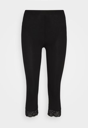 Black leggings with a snug fit, featuring a lace trim at the hem. Made from a smooth, stretchy material for comfort and flexibility.