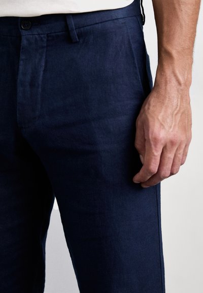 NN.07 THEO - Püksid - dark blue