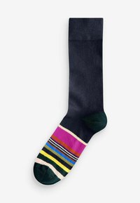 Calza navy con un motivo a righe colorate sulla punta, che presenta tonalità di rosa, giallo, verde e blu. Materiale in cotone misto con una consistenza liscia.