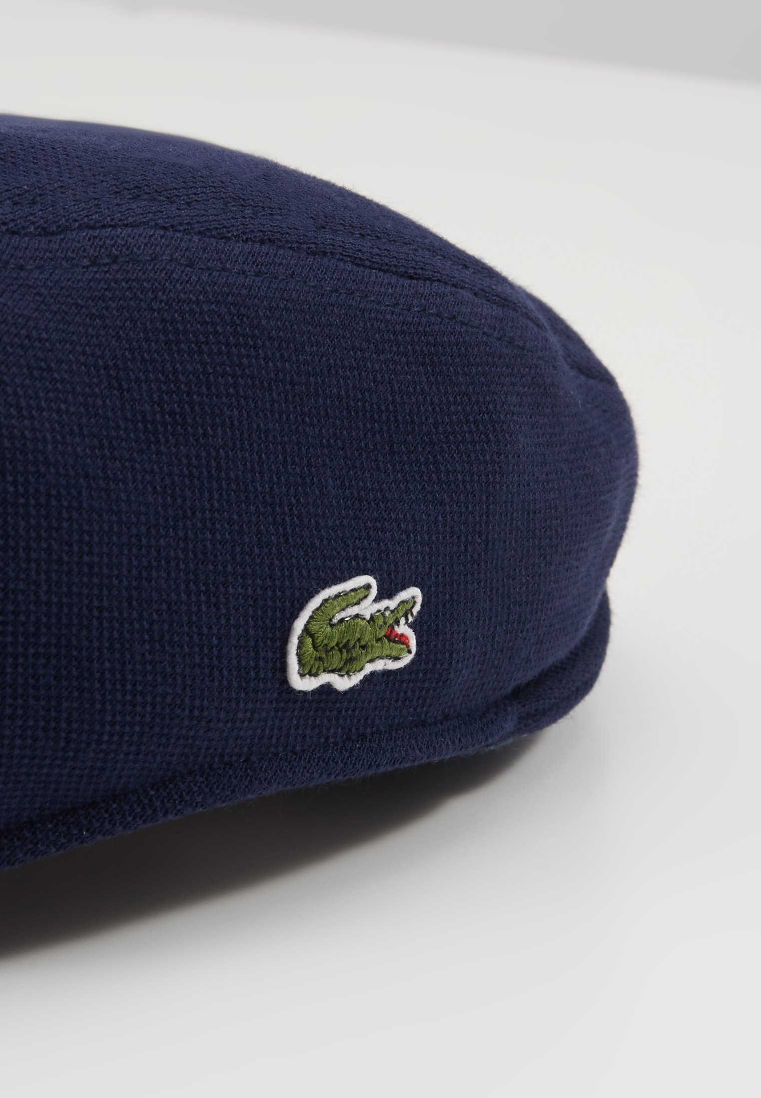 lacoste flat cap