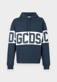 Sweat à capuche bleu marine avec bande horizontale blanche sur la poitrine et les manches, comportant de grandes lettres GCDS bleu foncé et capuche à cordon de serrage.
