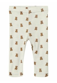 Leggings pour bébé de couleur crème avec de petits imprimés d'ours en peluche marron sur toute la surface, dotés d'une taille élastique et de jambes droites.