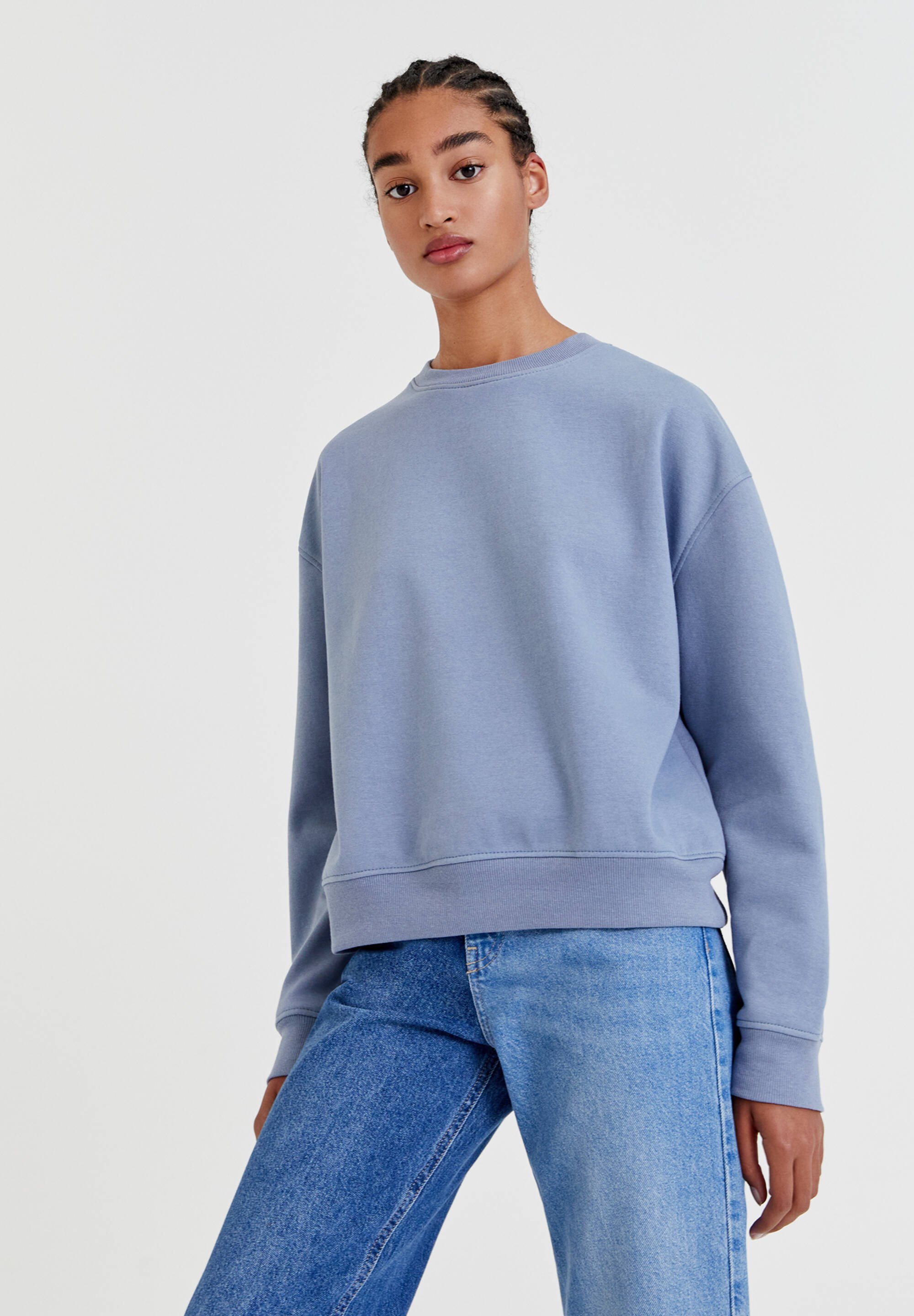 oversized light blue sweatshirt