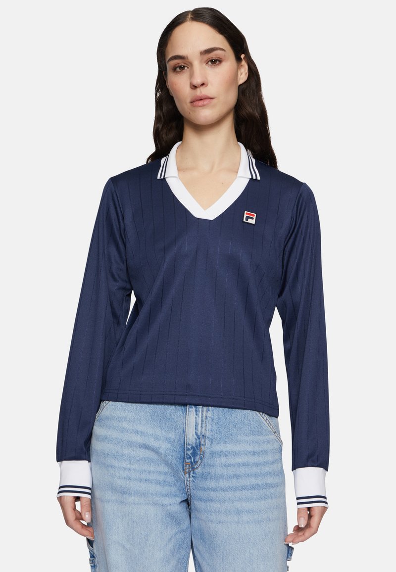 Polo a maniche lunghe blu navy con scollo a V, colletto e polsini bianchi, righe verticali e un piccolo logo sul lato sinistro del petto.