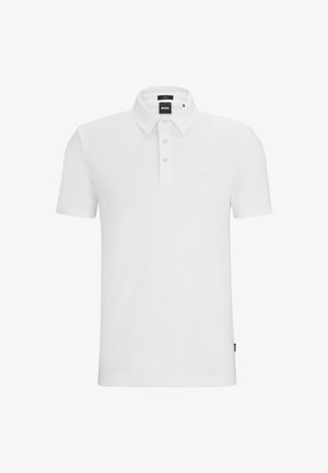 White polo shirt made of cotton, featuring a collared neckline, three-button placket, short sleeves, and a subtle brand logo.