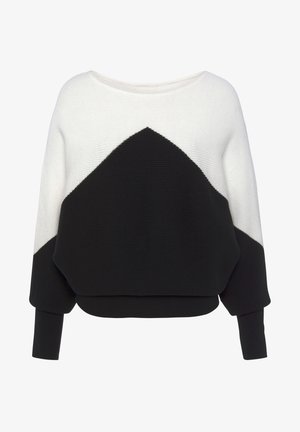 Black and white knitted sweater with a wide neckline, drop shoulders, and a black triangular pattern on the front. Textured fabric.