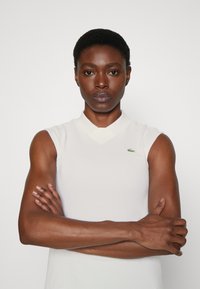 Lacoste Sport SLEEVELESS GOLF - Polotričko - blanc