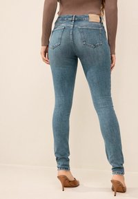 Next TALL - Liibuvad teksad - smoky blue