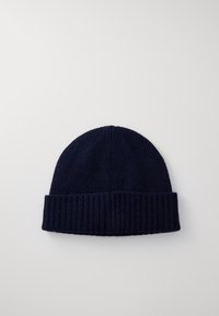 Navy knit beanie with a ribbed texture and rolled cuff, made of soft fabric, designed for warmth and comfort.