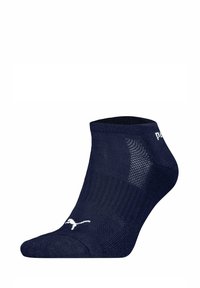 Marineblauwe enkelsok met ribbeltextuur en meshpanelen. Beschikt over een wit logo aan de zijkant en een versterkte teen voor duurzaamheid.