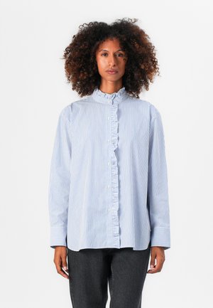 Camicia a maniche lunghe a righe blu e bianche in cotone, con colletto alla mandarina arricciato e chiusura con bottoni, e maniche con polsini.