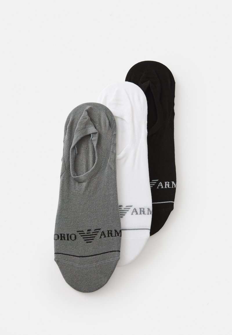 Tre coppie di calzini invisibili in grigio, bianco e nero. Tessuto morbido con una forma curvata e dettaglio del logo vicino alla caviglia.